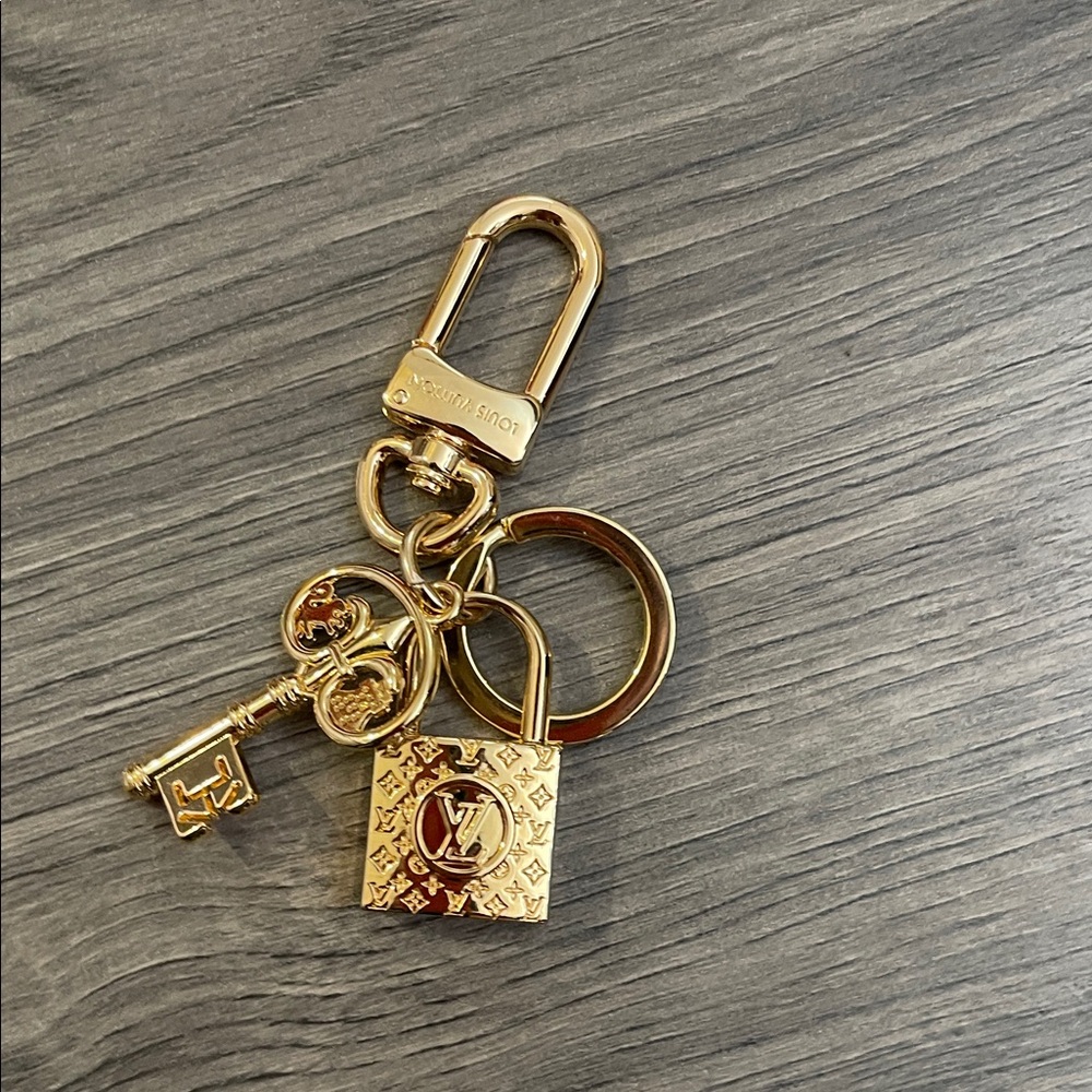 Gold key chain or bag charm